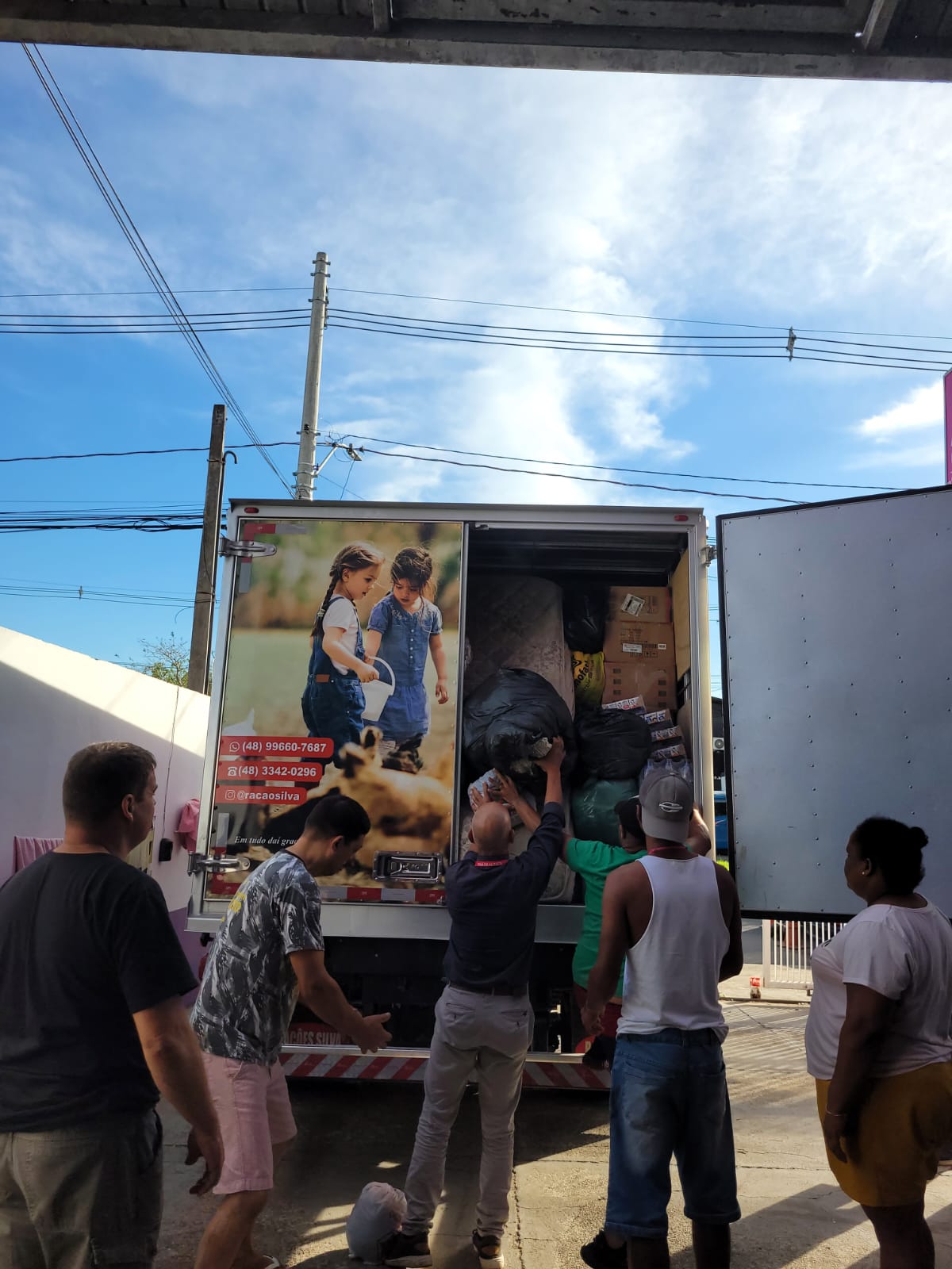 Homenagem aos voluntários e abrigados
